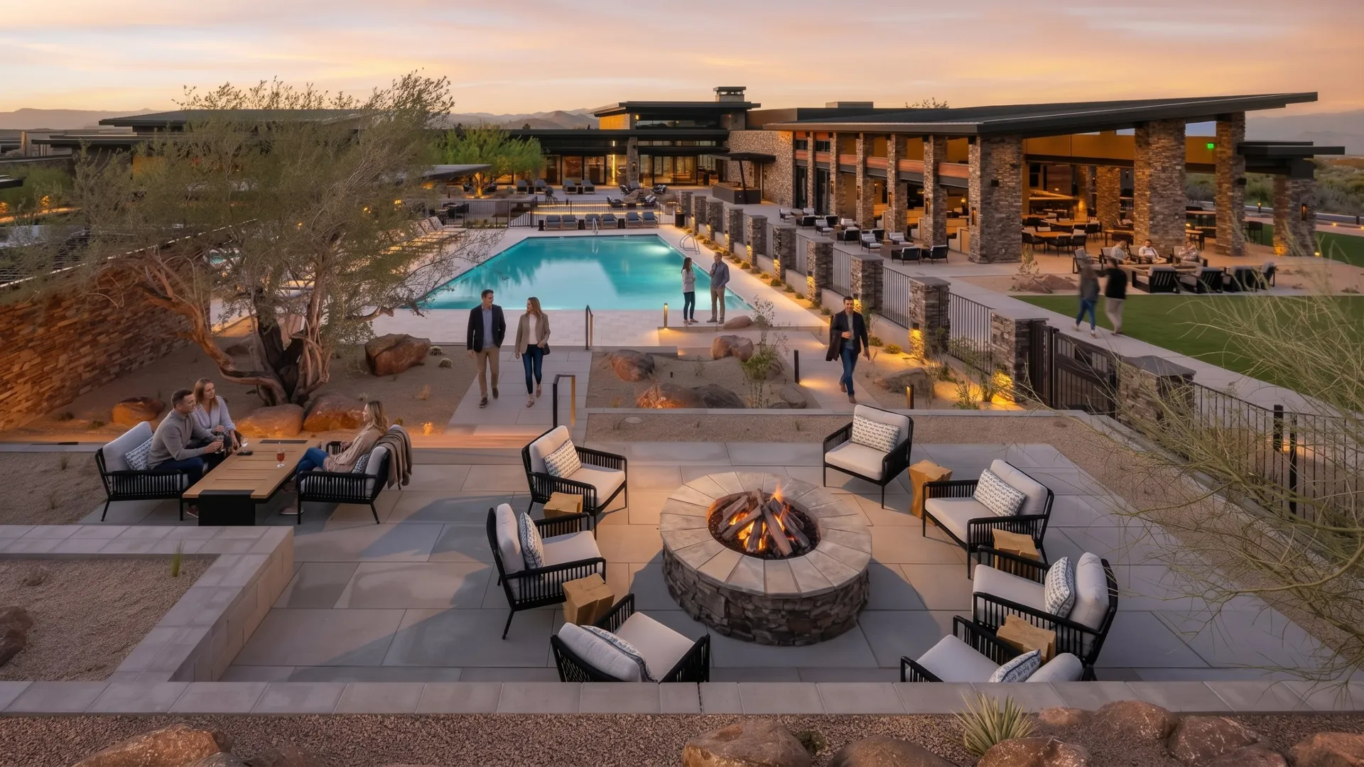 The Lodge's pool, fire pit lounge and Alterra's terrace at dusk